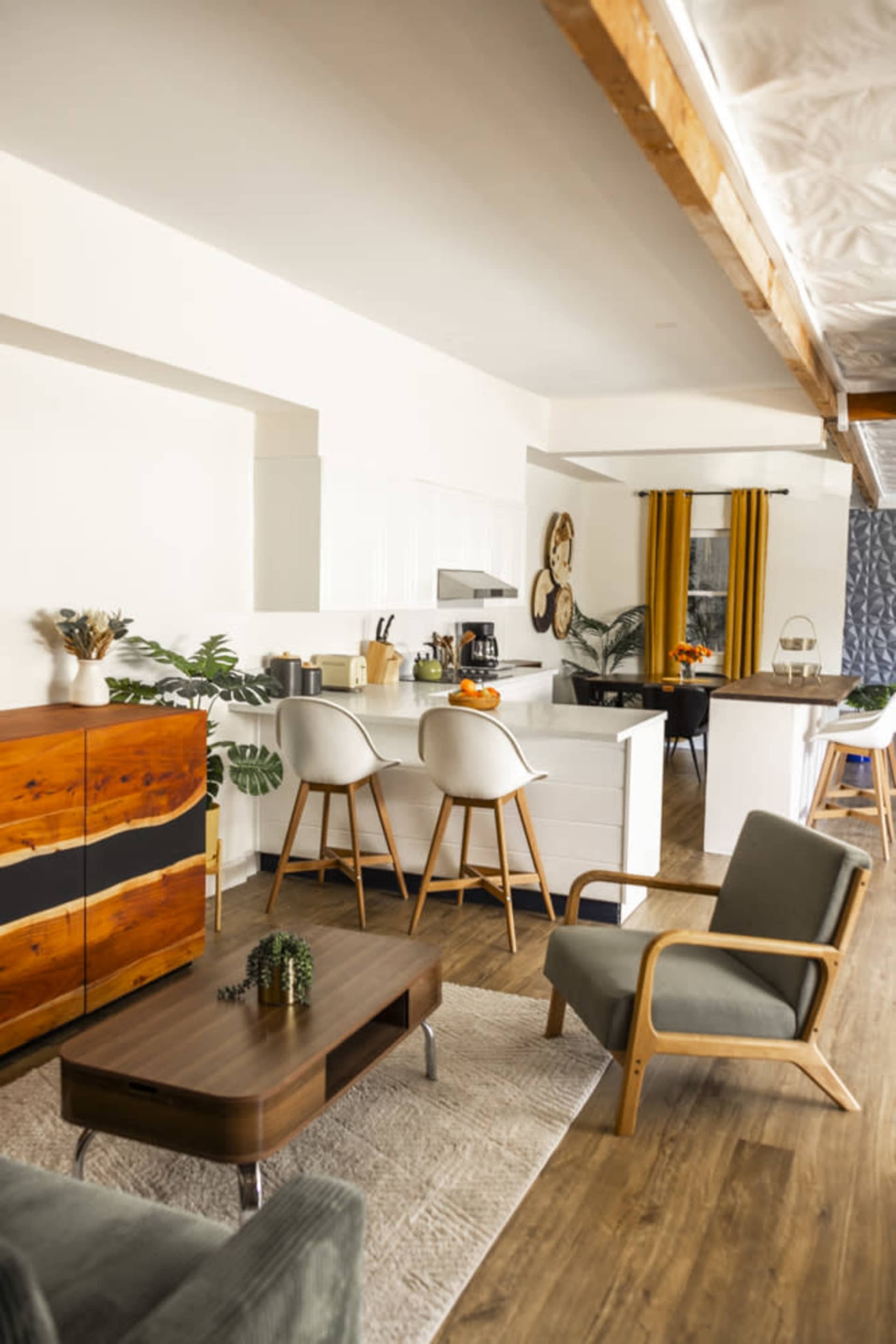 Open-concept kitchen, dining, and seating